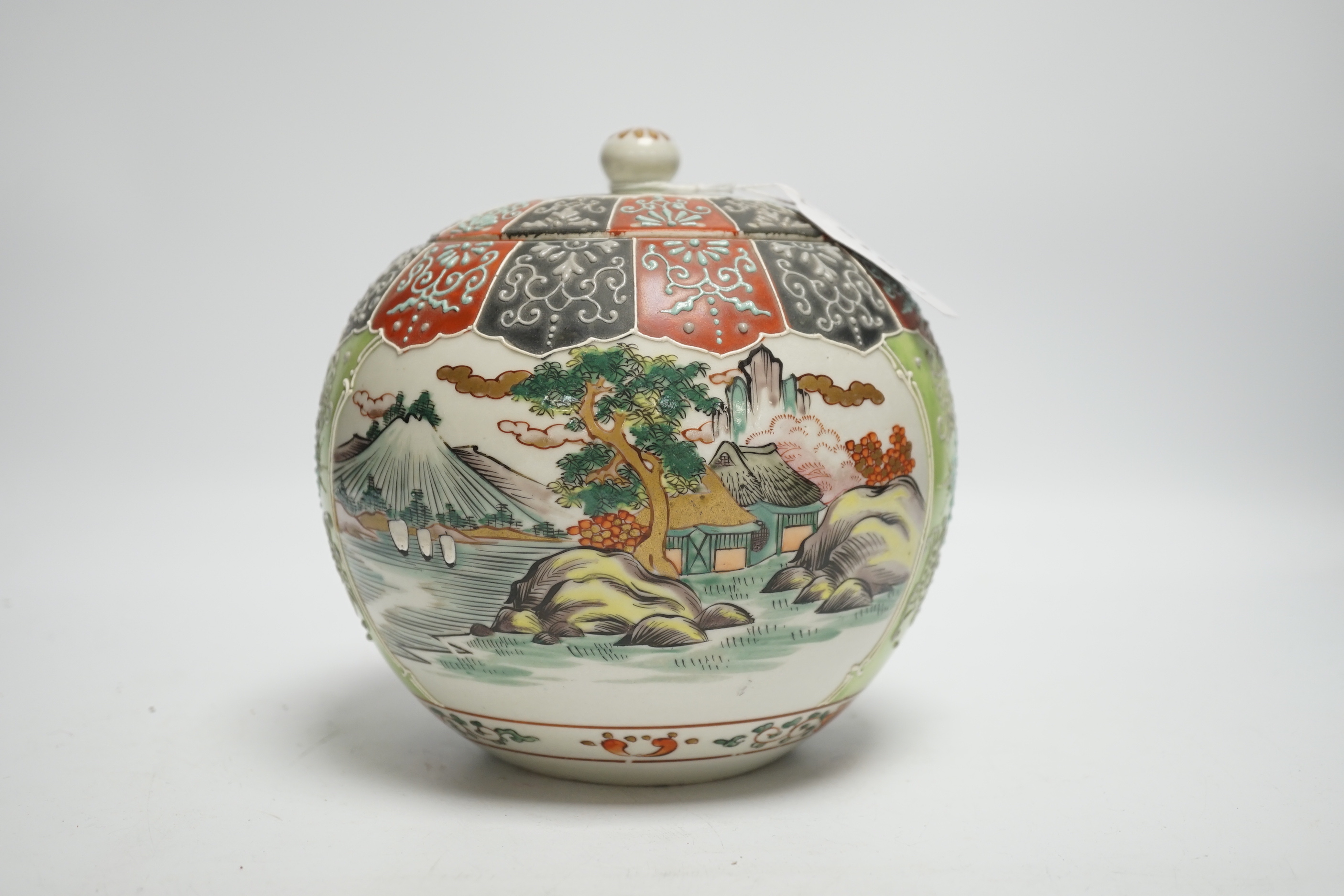 An early 20th century Japanese famille rose snuff bottle together with three others and a lidded jar